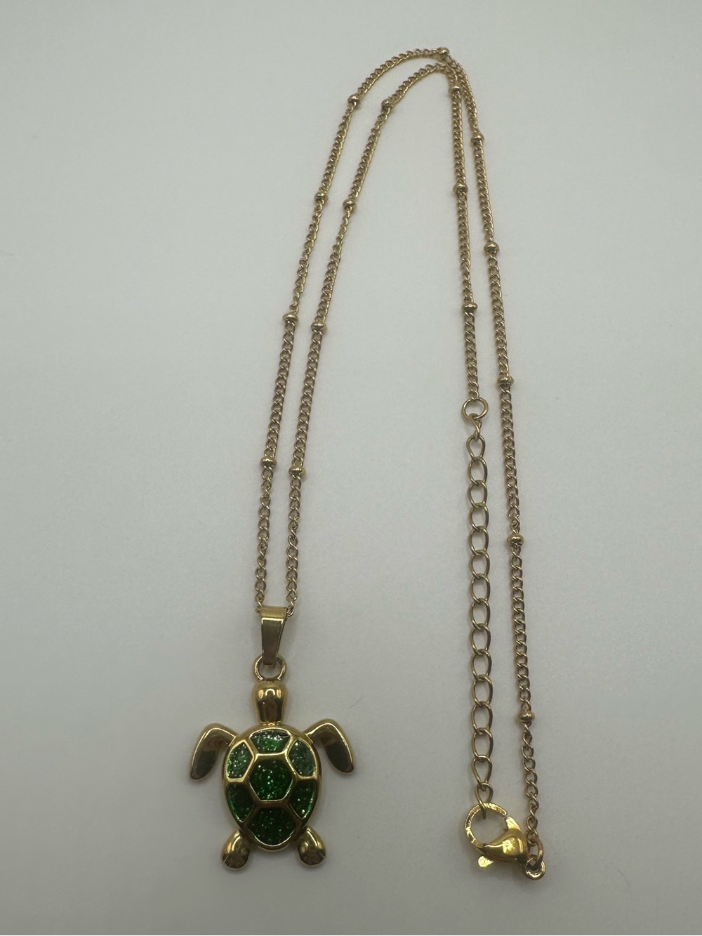 Gold-Tone Turtle Pendant Necklace with Green Enamel Shell